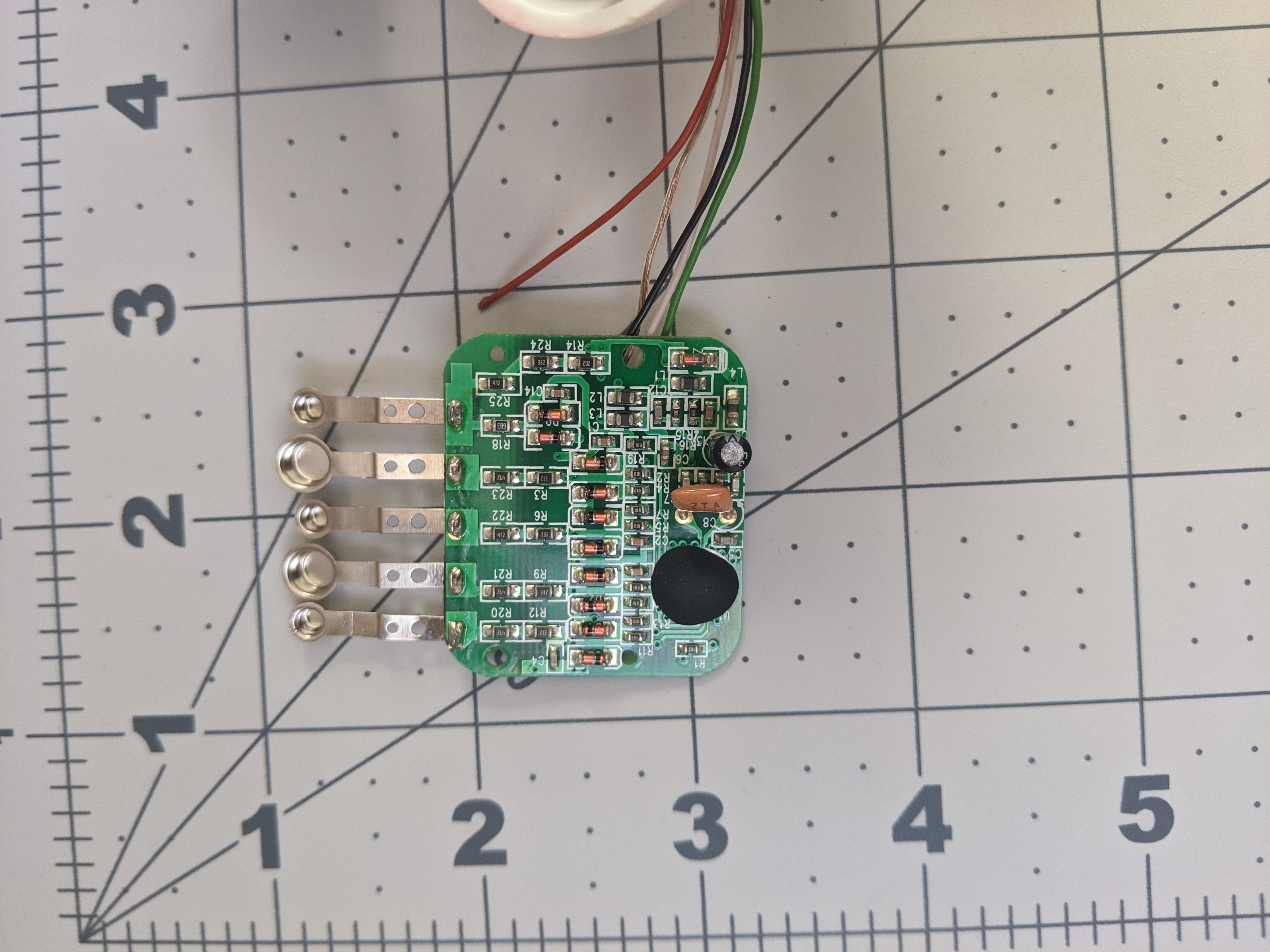 The opposite side of the PCB/ It's covered in surface mounted components.